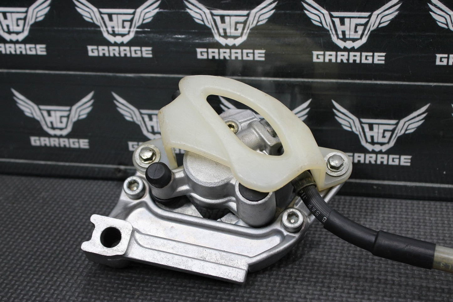 2003 KAWASAKI KX65 OEM NISSIN REAR BACK BRAKE CALIPER 43041 - 1711 43095 - 1228 - hggarage