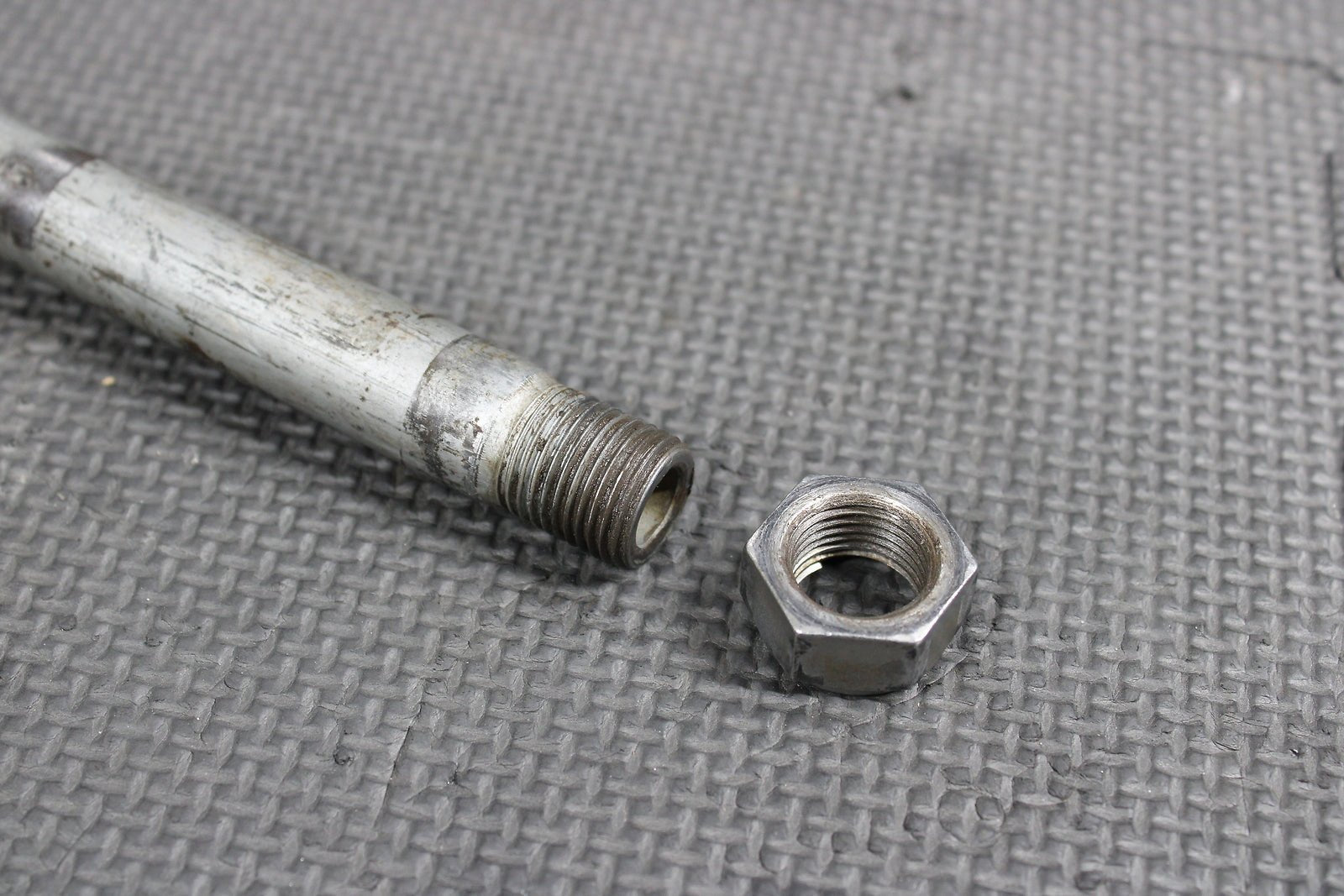 2009 Kawasaki KX250F OEM Rear Back Swingarm Bolt Suspension Pivot Axle 33032 - 001 - hggarage