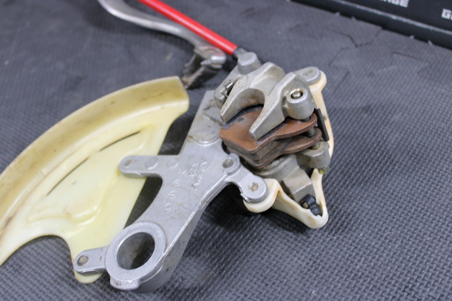 2007 HONDA CR125R CR250R CRF450R OEM REAR BACK BRAKE CALIPER MASTER CYLINDER ASS