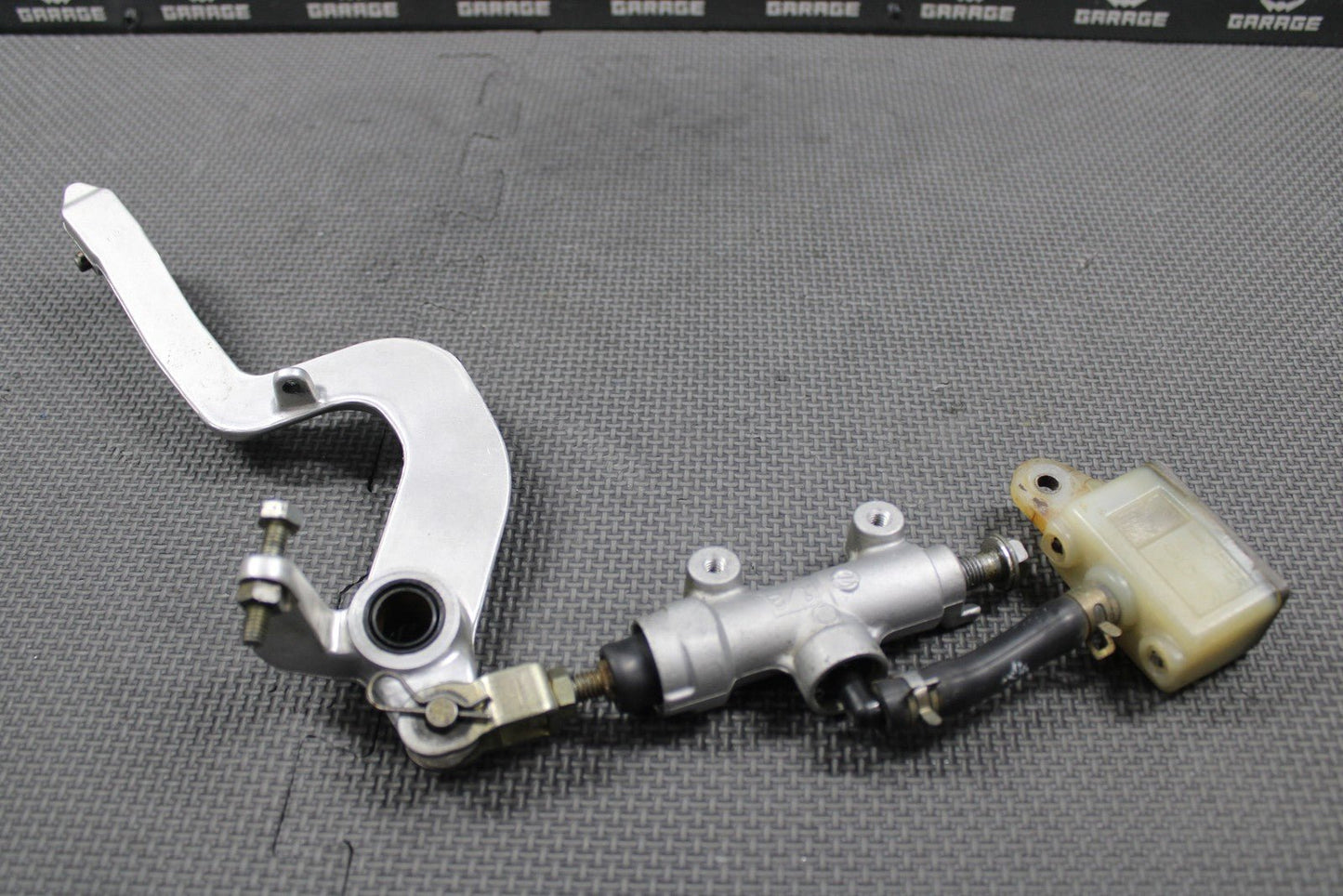 2003 KAWASAKI KLX400SR OEM REAR BACK BRAKE MASTER CYLINDER W RESERVOIR & PEDAL - hggarage