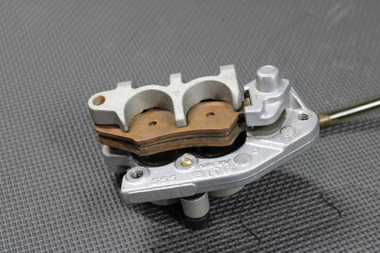 2006 Kawasaki KX450F OEM Nissin Front Brake Caliper Master Cylinder 43015 - 0167 - hggarage