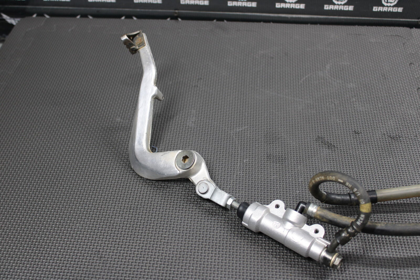 2008 KAWASAKI KX100 KX112 KX85 OEM REAR BACK BRAKE CALIPER MASTER CYLINDER LEVER