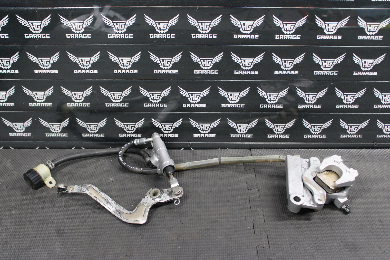 1995 KAWASAKI KX80 OEM NISSIN REAR BACK BRAKE CALIPER MASTER CYLINDER ASSEMBLY - hggarage