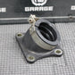 2003 KAWASAKI KX65 00 - 22 OEM INTAKE REED BLOCK ASSEMBLY 12021 - 1015 - hggarage