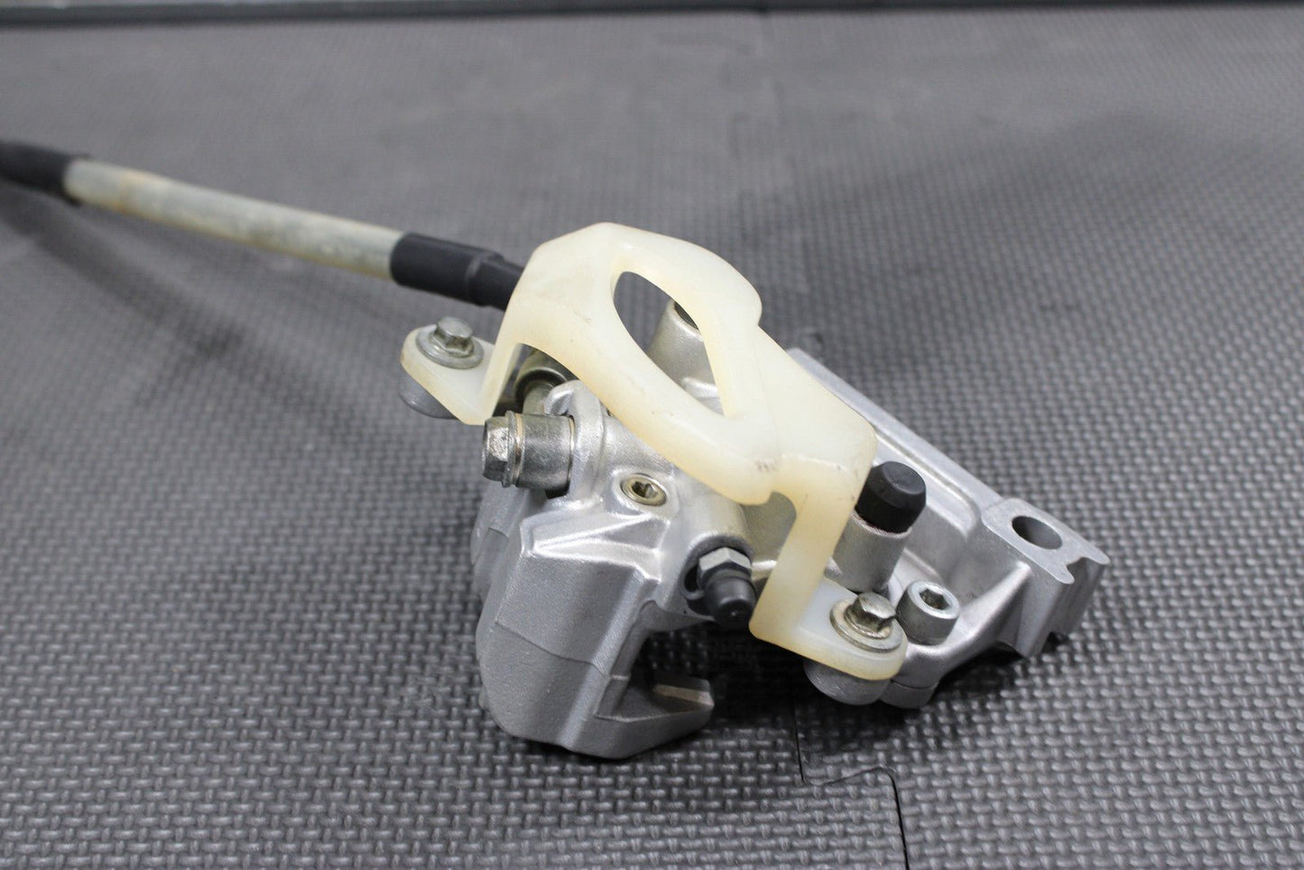 2003 KAWASAKI KX65 OEM NISSIN REAR BACK BRAKE CALIPER 43041 - 1711 43095 - 1228 - hggarage