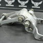 1999 KAWASAKI KX100 OEM REAR SHOCK LINKAGE LINKS SUSPENSION ARM ASSEMBLY