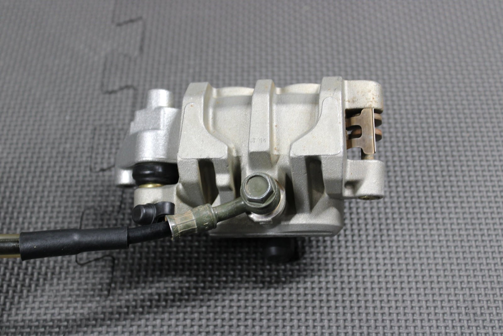2006 Kawasaki KX450F OEM Nissin Front Brake Caliper Master Cylinder 43015 - 0167 - hggarage