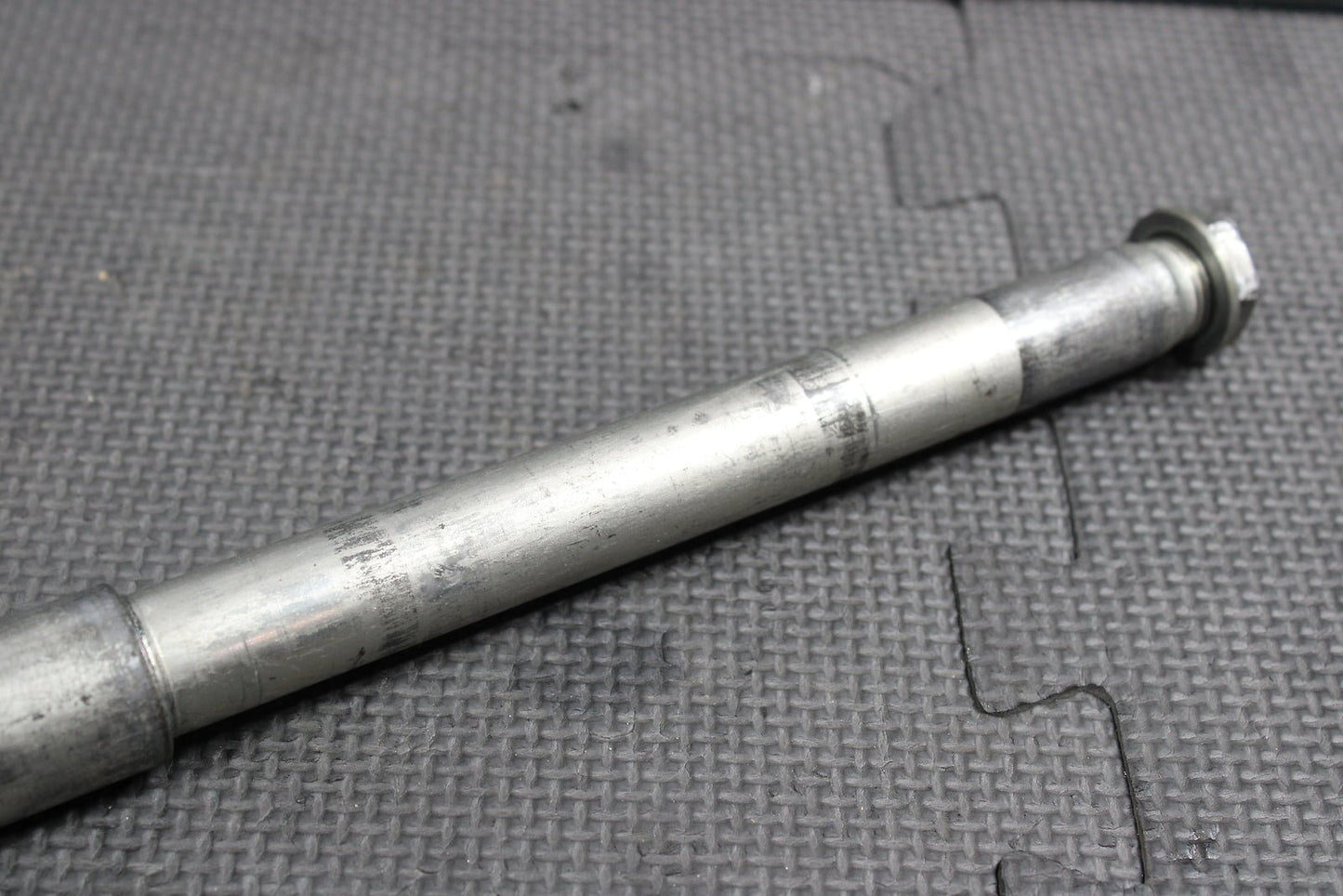2009 Kawasaki KX250F OEM Front Wheel Rim Axle Pivot Bolt - hggarage