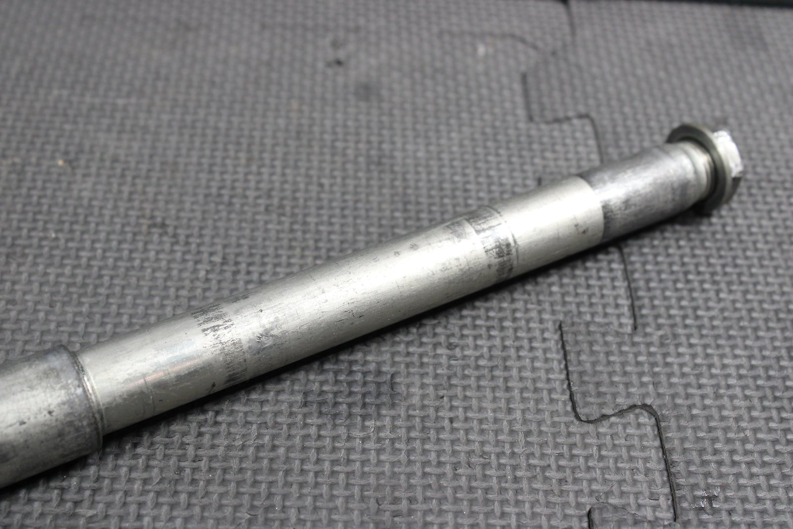 2009 Kawasaki KX250F OEM Front Wheel Rim Axle Pivot Bolt - hggarage