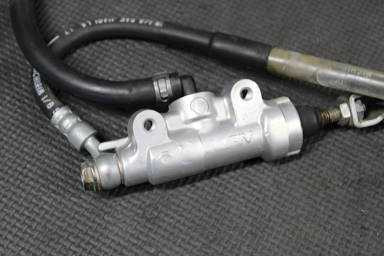 1995 KAWASAKI KX80 OEM NISSIN REAR BACK BRAKE CALIPER MASTER CYLINDER ASSEMBLY - hggarage