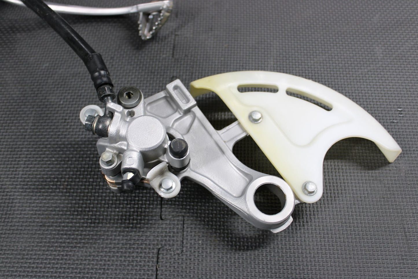 2006 HONDA CRF450X OEM NISSIN REAR BACK BRAKE CALIPER MASTER CYLINDER LEVER - hggarage