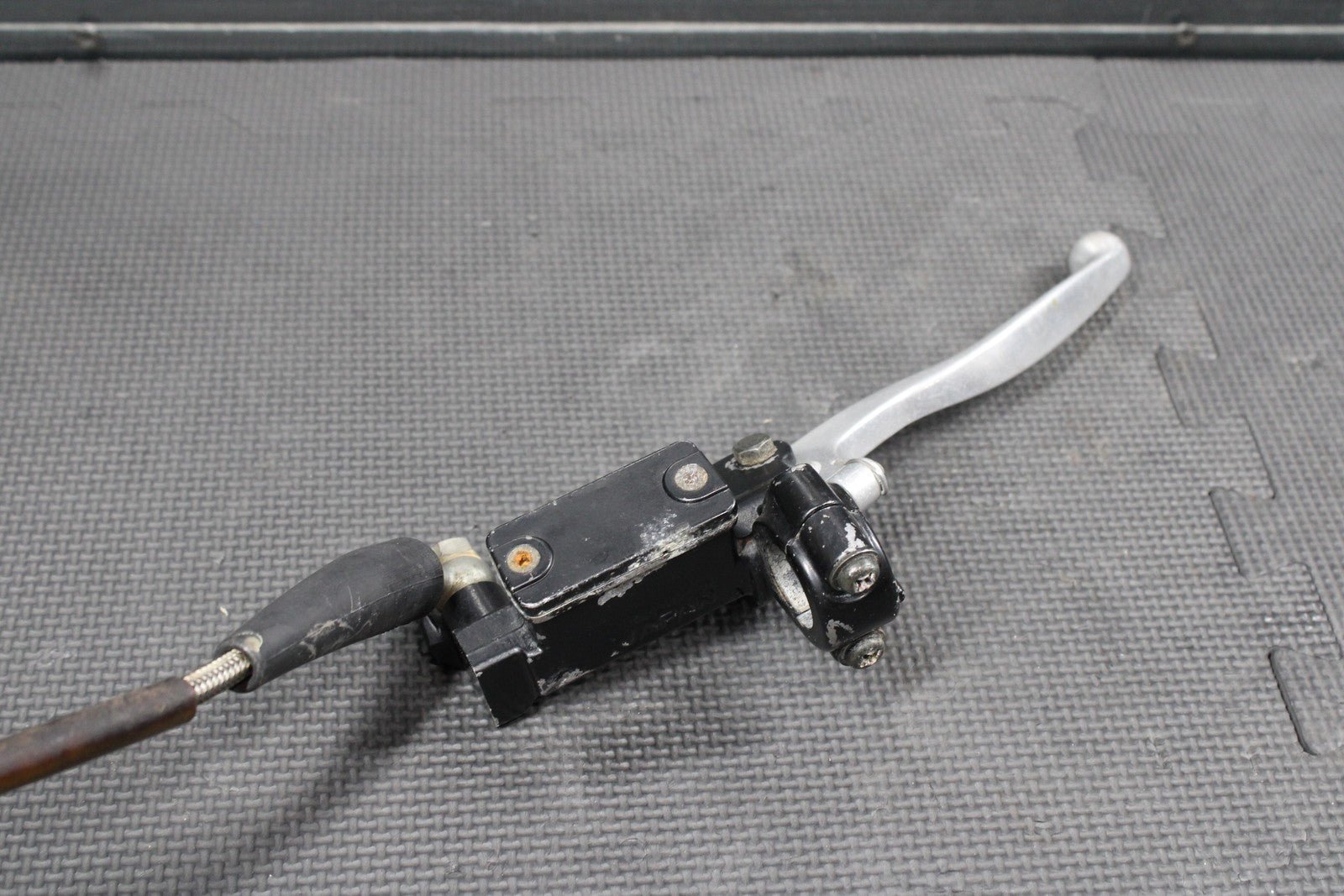 1986 KAWASAKI KDX200 OEM TOKICO FRONT BRAKE CALIPER MASTER CYLINDER ASSEMBLY - hggarage