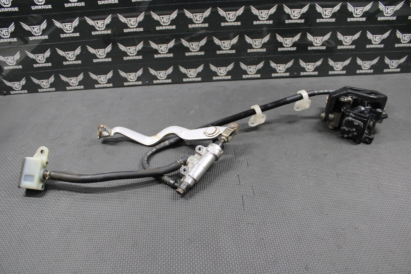 2009 KAWASAKI 2009 2010 KLX250SF OEM NISSIN REAR BACK BRAKE CALIPER MASTER LEVER - hggarage