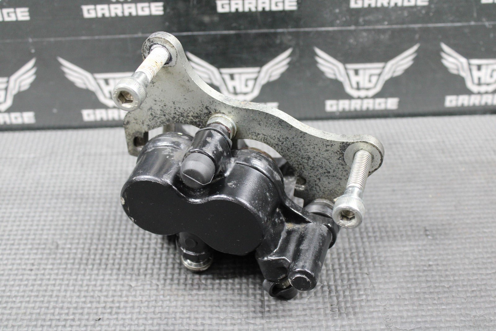 2009 2010 KAWASAKI KLX250SF OEM FRONT BRAKE CALIPER & BRACKET 43080 - 0064 - 25S - hggarage