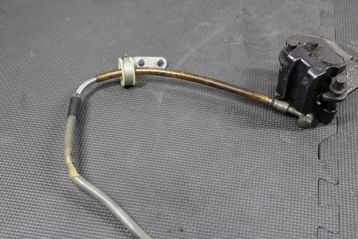 1986 KAWASAKI KDX200 OEM TOKICO FRONT BRAKE CALIPER MASTER CYLINDER ASSEMBLY - hggarage