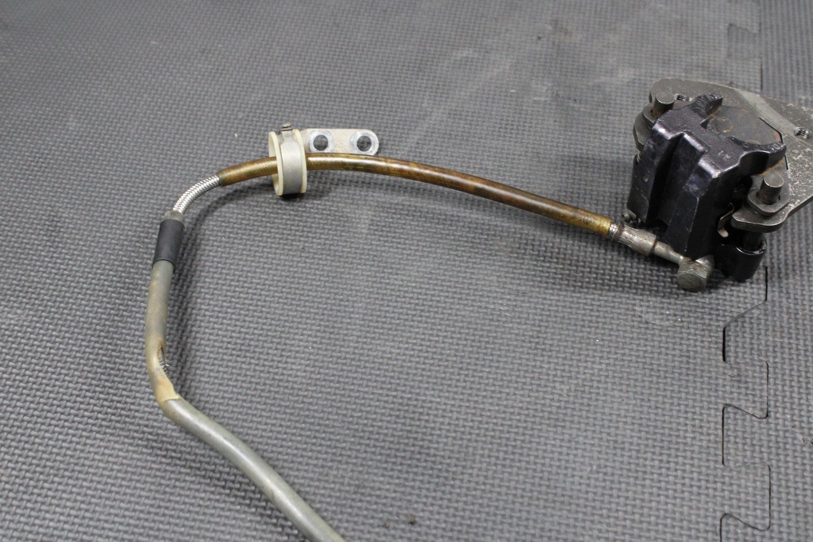 1986 KAWASAKI KDX200 OEM TOKICO FRONT BRAKE CALIPER MASTER CYLINDER ASSEMBLY - hggarage