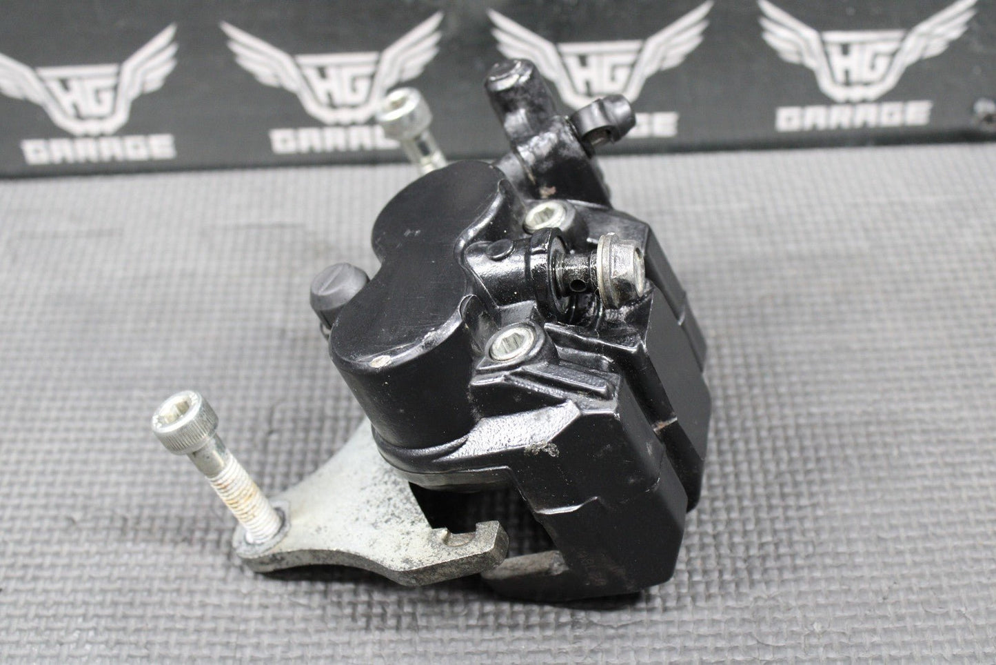 2009 2010 KAWASAKI KLX250SF OEM FRONT BRAKE CALIPER & BRACKET 43080 - 0064 - 25S - hggarage