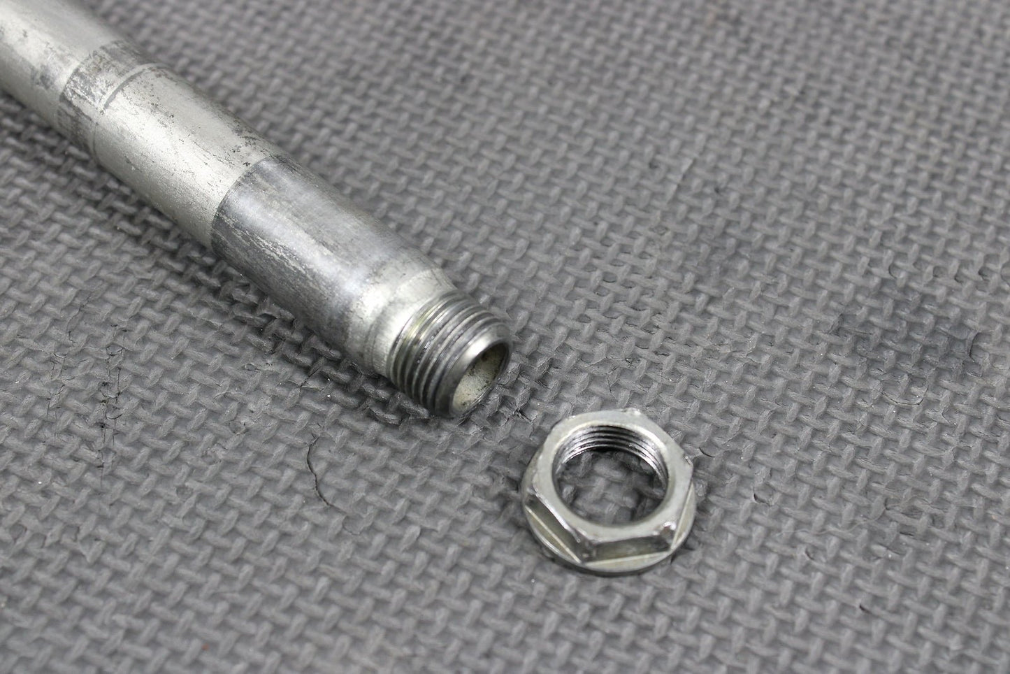 2009 Kawasaki KX250F OEM Front Wheel Rim Axle Pivot Bolt - hggarage