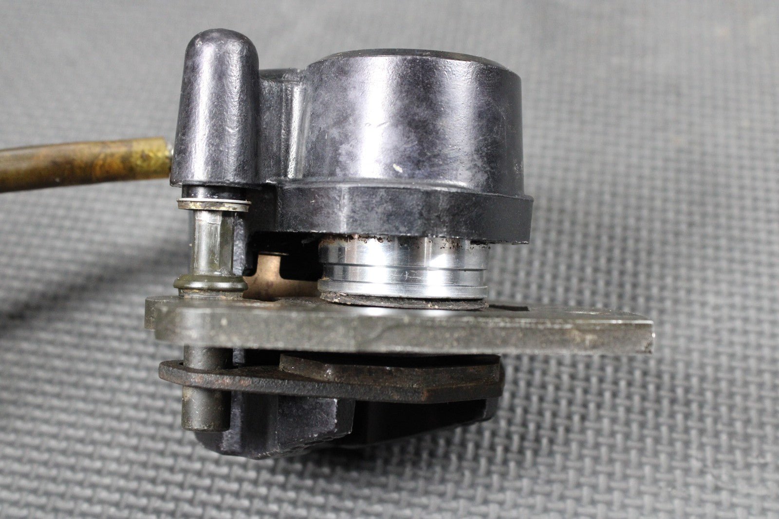 1986 KAWASAKI KDX200 OEM TOKICO FRONT BRAKE CALIPER MASTER CYLINDER ASSEMBLY - hggarage