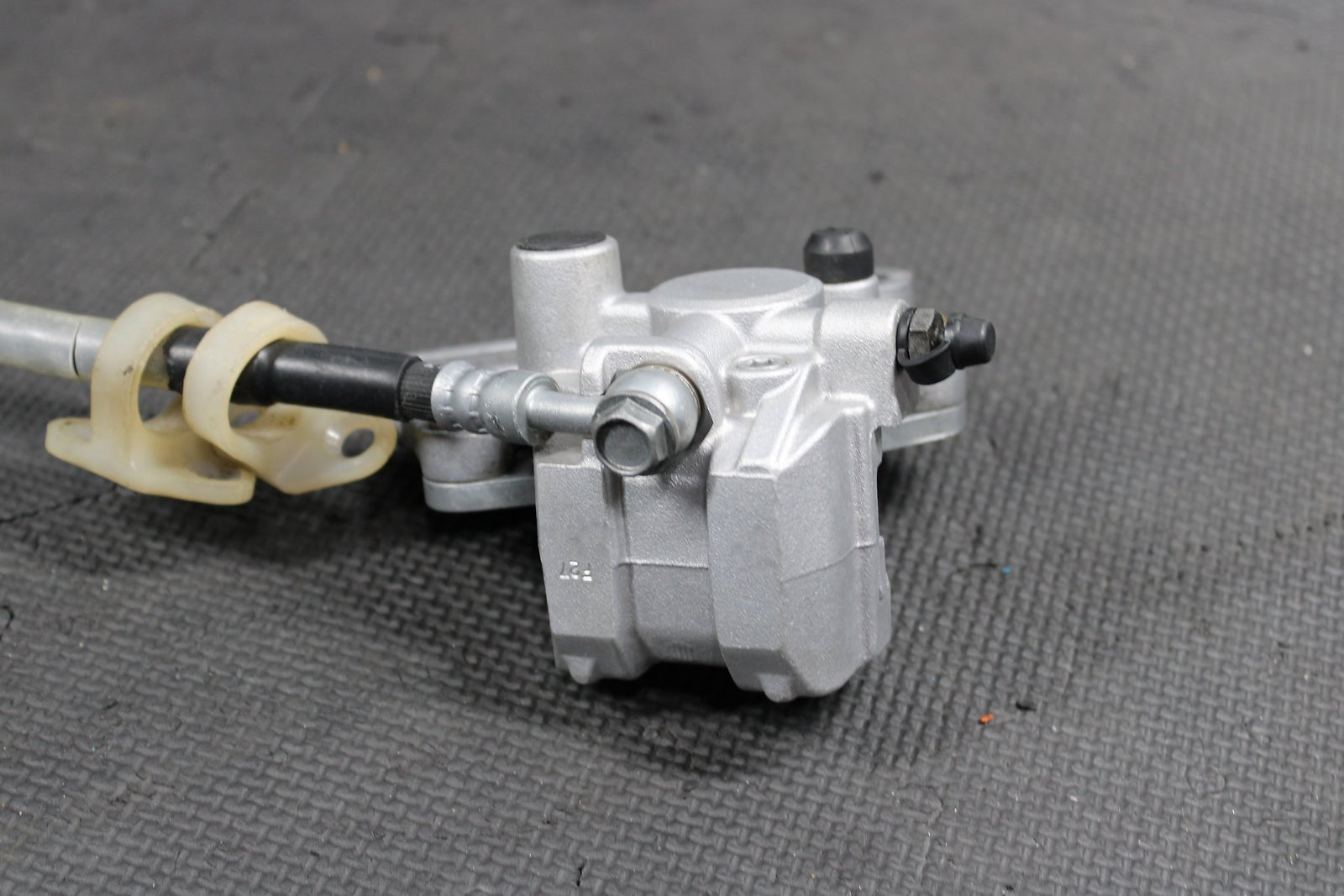 1995 KAWASAKI KX80 OEM NISSIN REAR BACK BRAKE CALIPER MASTER CYLINDER ASSEMBLY - hggarage