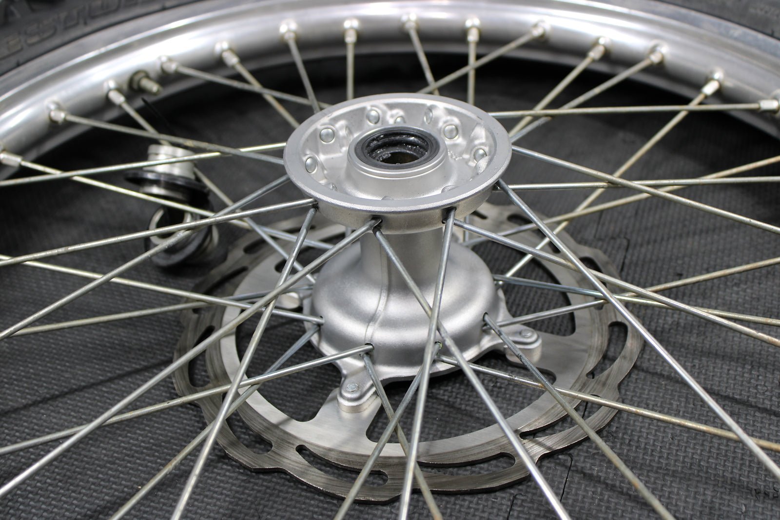 2006 Suzuki 05 - 07 RMZ450 RM450 OEM Front Wheel Rim Hub Tire Rotor Assembly - hggarage