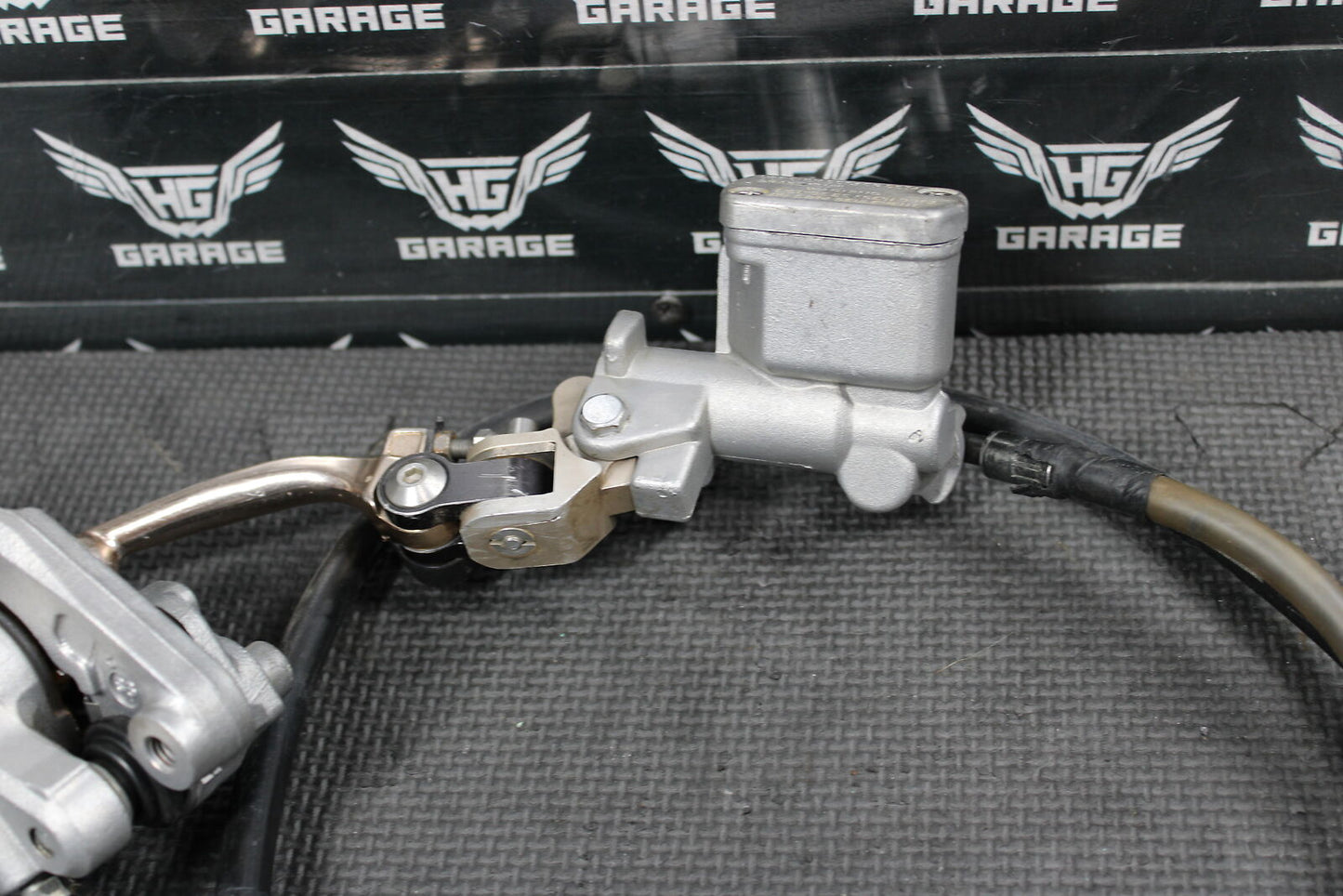 2000 HONDA CR125R OEM FRONT BRAKE CALIPER AFTERMARKET MASTER CYLINDER ASSEMBLY