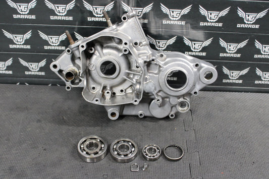 1999 SUZUKI RM125 OEM LEFT ENGINE MOTOR CRANKCASE CRANK CASE BOTTOM END - hggarage