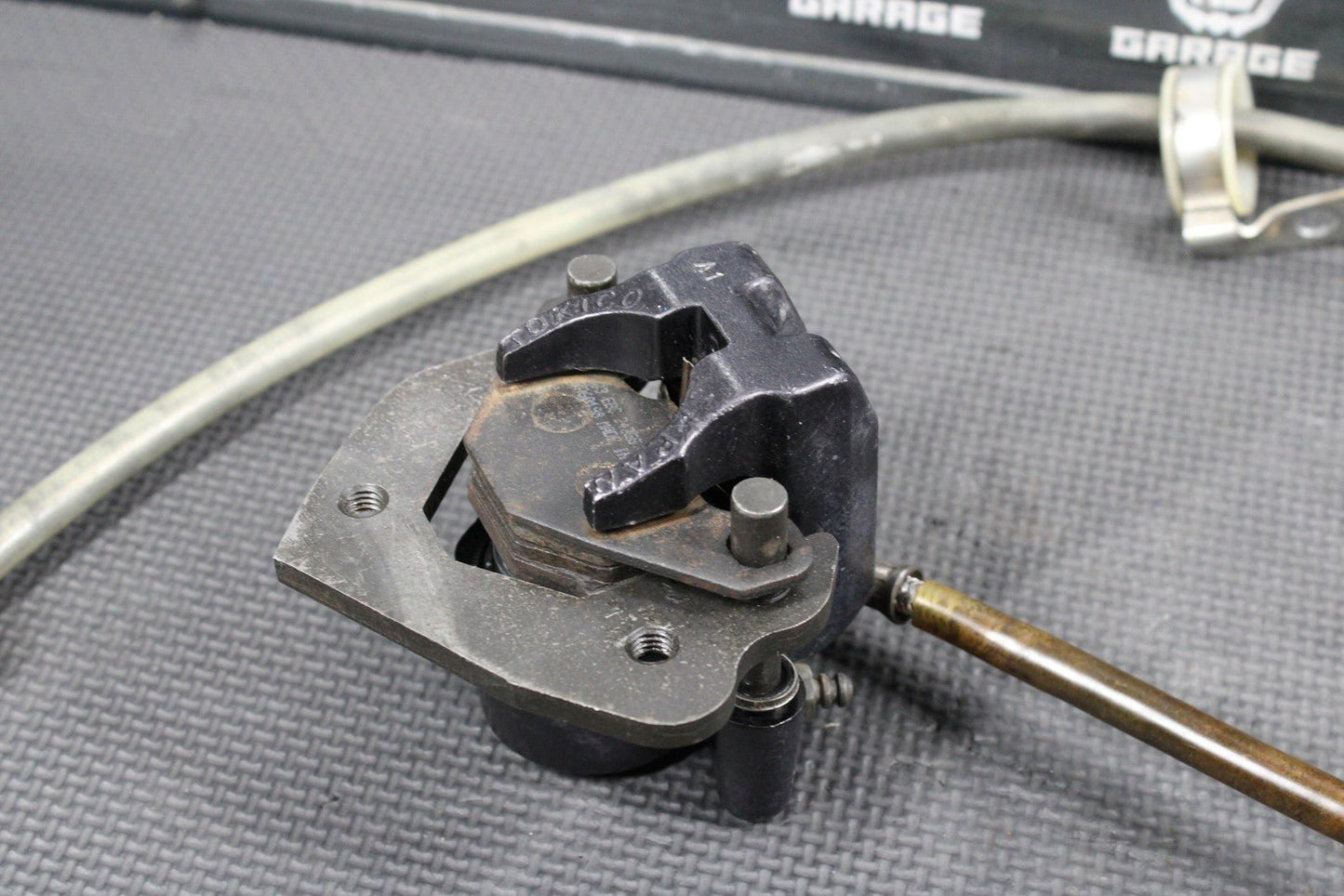 1986 KAWASAKI KDX200 OEM TOKICO FRONT BRAKE CALIPER MASTER CYLINDER ASSEMBLY - hggarage