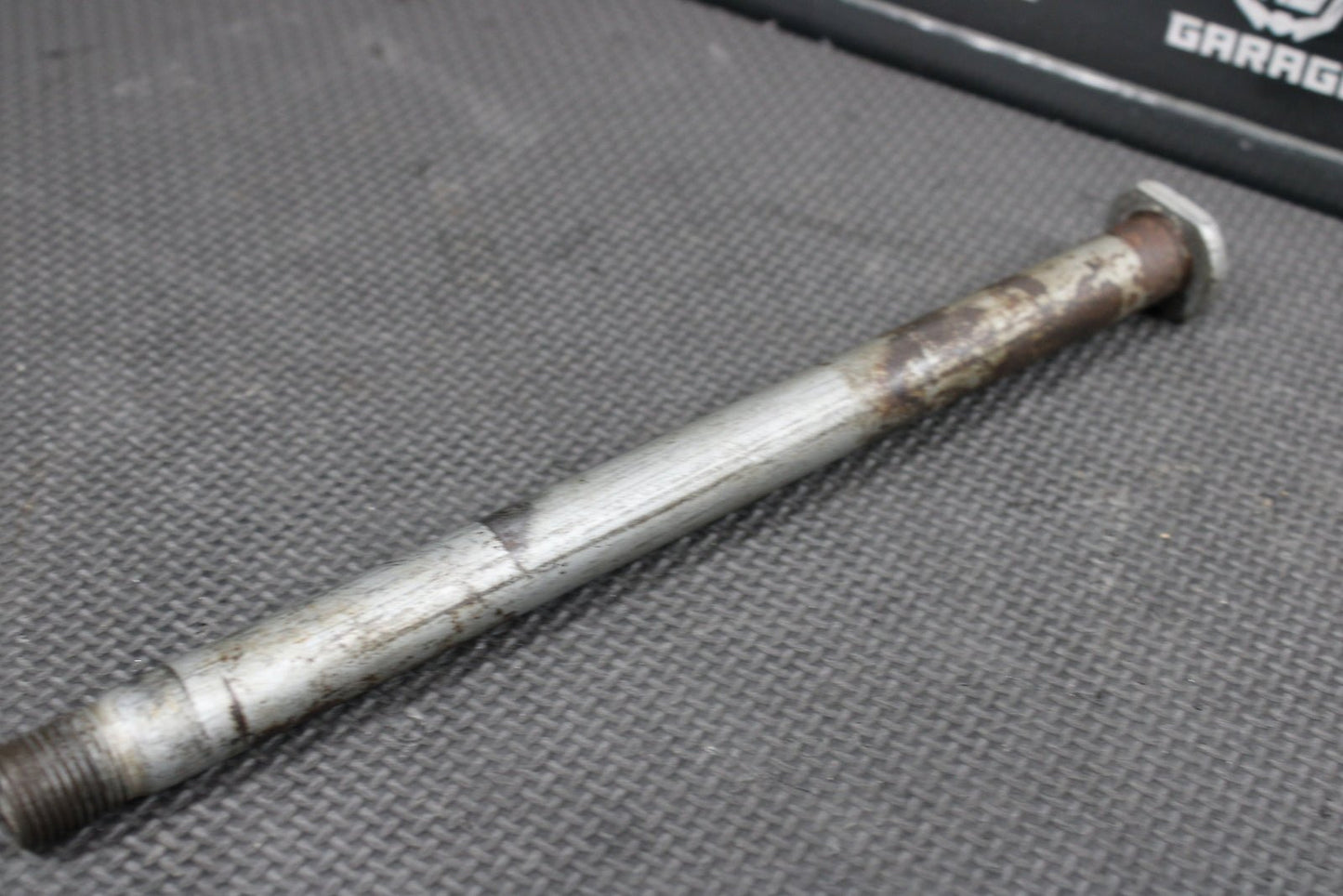 2009 Kawasaki KX250F OEM Rear Back Swingarm Bolt Suspension Pivot Axle 33032 - 001 - hggarage