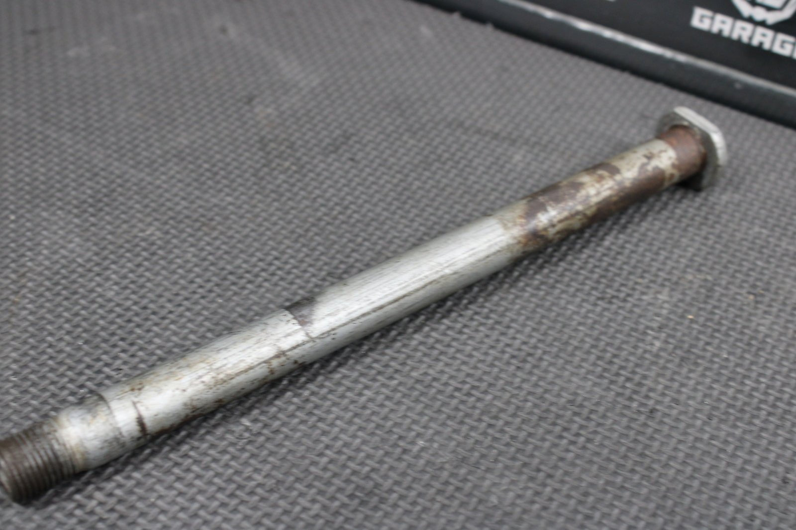 2009 Kawasaki KX250F OEM Rear Back Swingarm Bolt Suspension Pivot Axle 33032 - 001 - hggarage