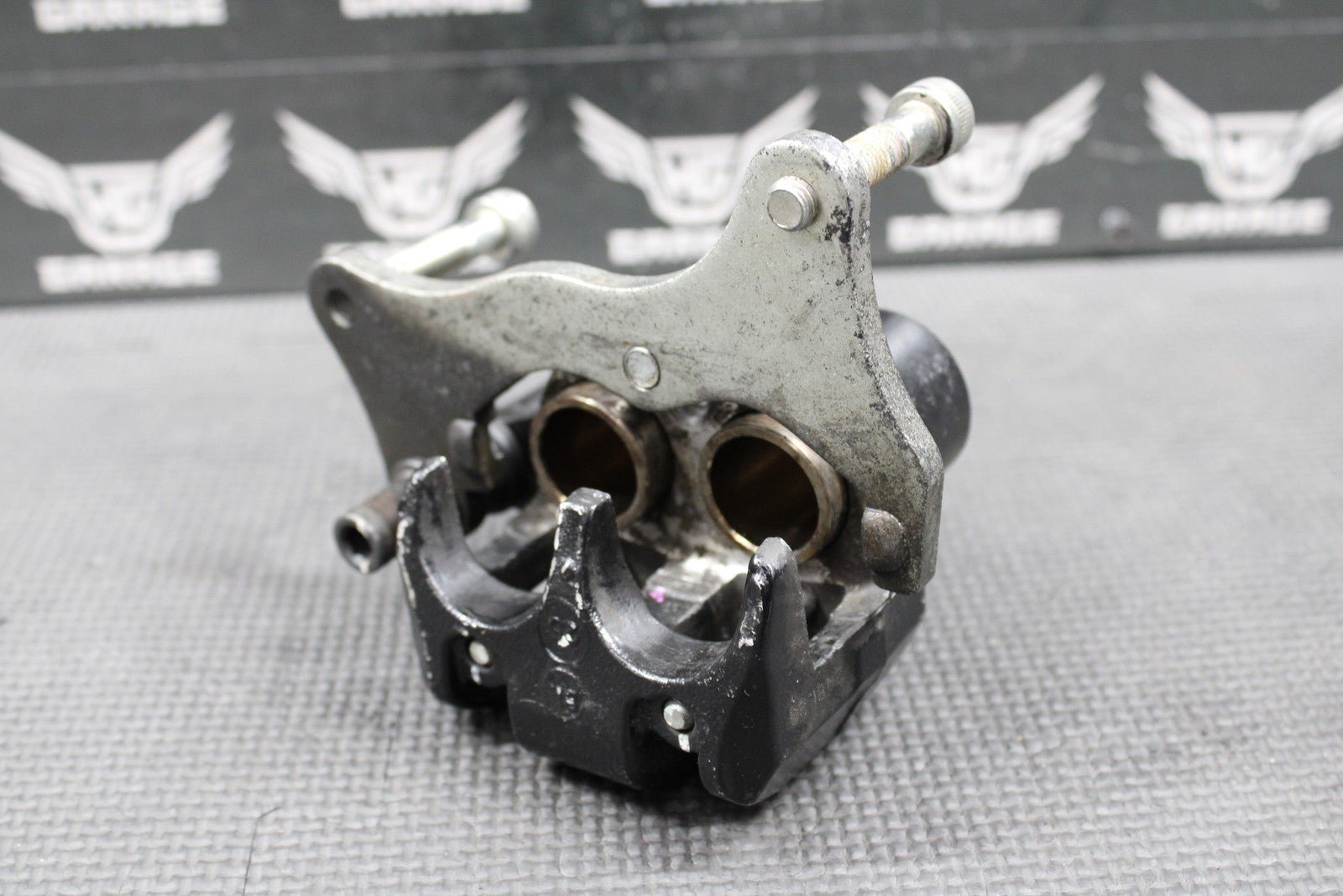 2009 2010 KAWASAKI KLX250SF OEM FRONT BRAKE CALIPER & BRACKET 43080 - 0064 - 25S - hggarage