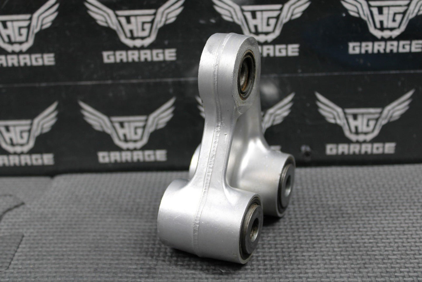 2001 HONDA CR125R OEM REAR SHOCK SWINGARM LINKAGE CUSHION ARM 52465 - KZ4 - J30 - hggarage