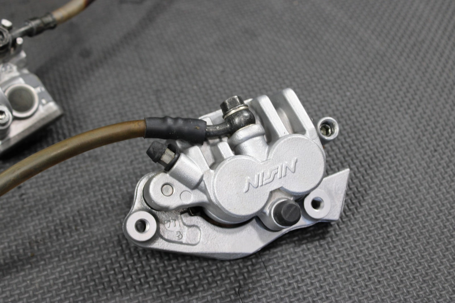 1998 HONDA 96 - 99 CR125R CR250R OEM NISSIN FRONT BRAKE CALIPER MASTER CYLINDER - hggarage