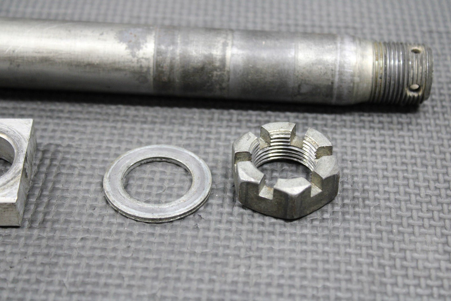 2014 KAWASAKI 04 - 14 KX250F OEM REAR AXLE BACK WHEEL RIM PIVOT BOLT 41068 - 1466 - hggarage