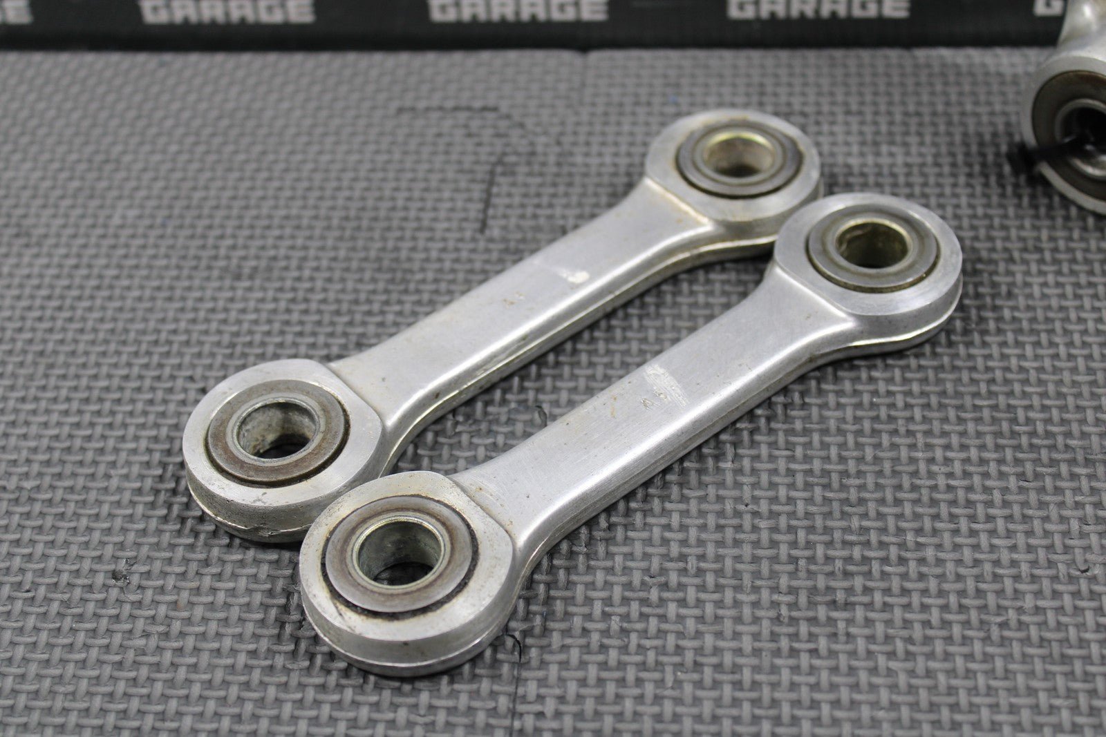 2003 KAWASAKI KLX400SR OEM REAR SHOCK LINKAGE LINKS TIE ROD ARM 39007 - S013 - hggarage
