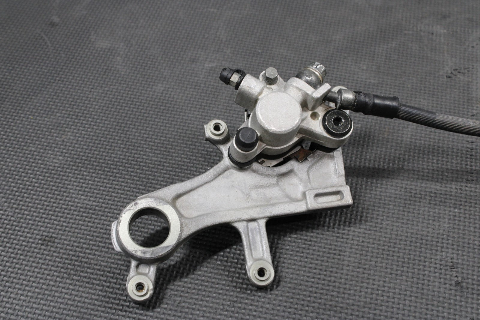 2023 HONDA CRF250R OEM REAR BACK BRAKE CALIPER MASTER CYLINDER LEVER COMPLETE - hggarage
