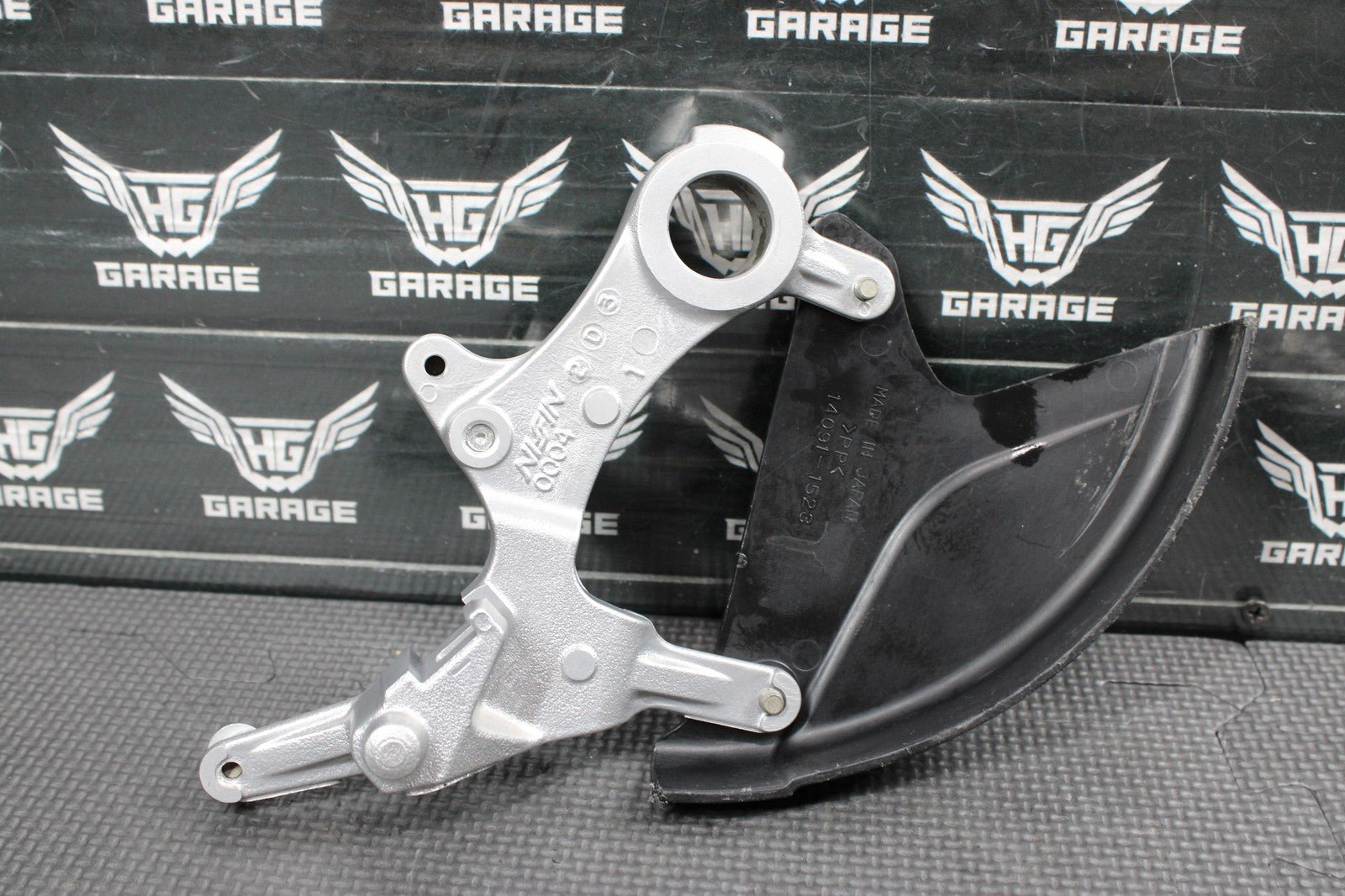 2014 KAWASAKI KX250F 04 - 18 OEM NISSIN REAR BACK BRAKE CALIPER HANGER 43080 - 0230 - hggarage