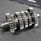 1995 KAWASAKI KX125 OEM ENGINE TRANSMISSION TRANNY ASSEMBLY GEARS 13127 - 1229 - hggarage