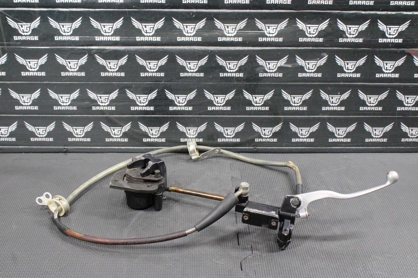 1986 KAWASAKI KDX200 OEM TOKICO FRONT BRAKE CALIPER MASTER CYLINDER ASSEMBLY - hggarage