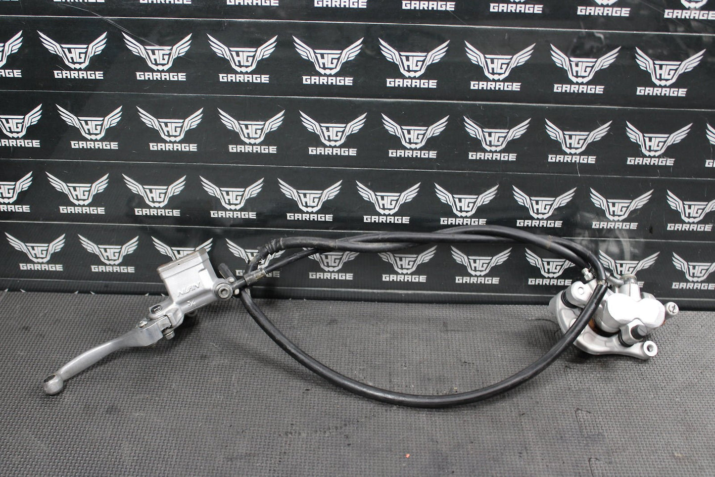 2011 Yamaha YZ125 OEM Nissin Front Brake Caliper Master Cylinder Assembly - hggarage