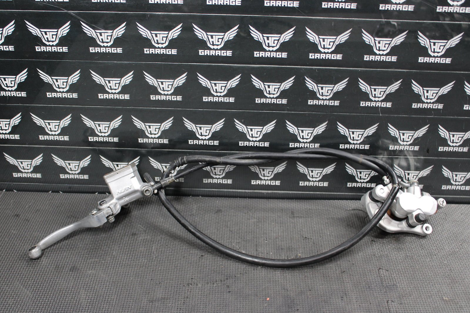 2011 Yamaha YZ125 OEM Nissin Front Brake Caliper Master Cylinder Assembly - hggarage