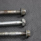 1998 KAWASAKI KX60 OEM FRONT REAR AXLE BACK WHEEL RIM PIVOT BOLT