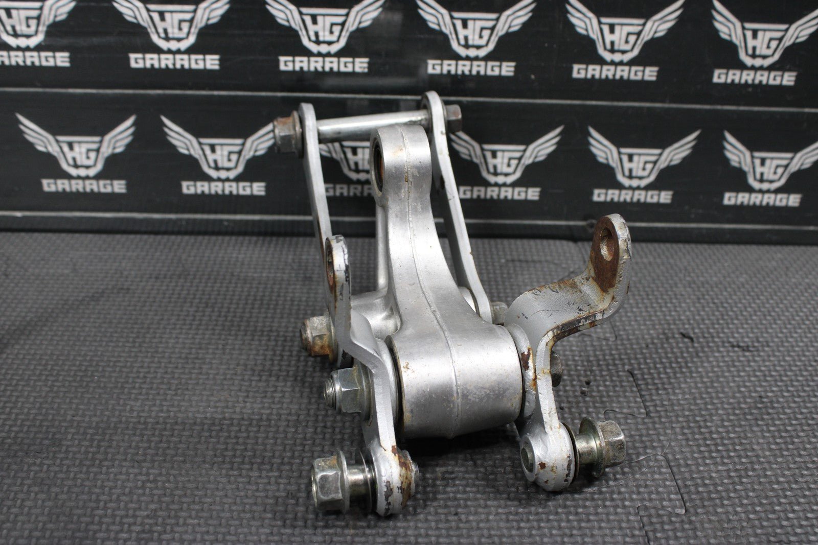 2001 KAWASAKI KX100 OEM REAR SHOCK LINKAGE RELAY ARM 39007 - 1262 - hggarage