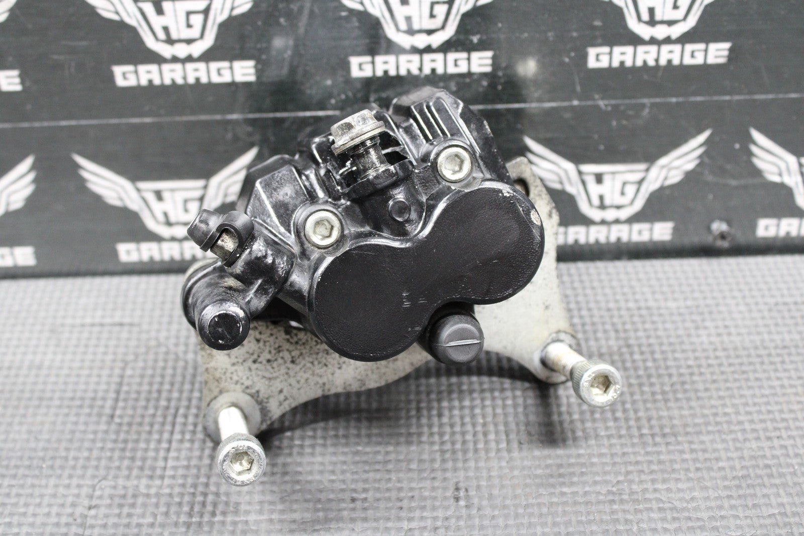 2009 2010 KAWASAKI KLX250SF OEM FRONT BRAKE CALIPER & BRACKET 43080 - 0064 - 25S - hggarage