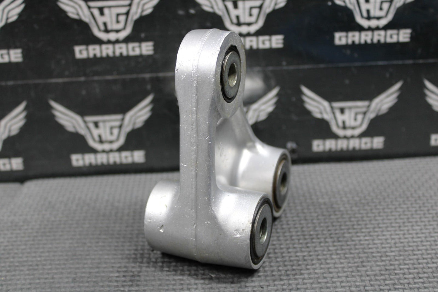 2001 HONDA CR125R OEM REAR SHOCK SWINGARM LINKAGE CUSHION ARM 52465 - KZ4 - J30 - hggarage