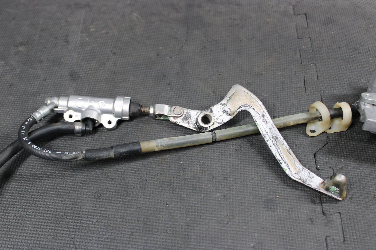1995 KAWASAKI KX80 OEM NISSIN REAR BACK BRAKE CALIPER MASTER CYLINDER ASSEMBLY - hggarage