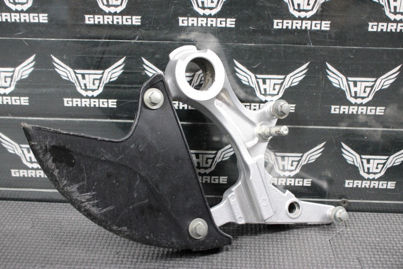 2014 KAWASAKI KX250F 04 - 18 OEM NISSIN REAR BACK BRAKE CALIPER HANGER 43080 - 0230 - hggarage