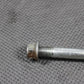 2005 KAWASAKI KX100 OEM FRONT REAR AXLE BACK WHEEL RIM SWINGARM BOLT