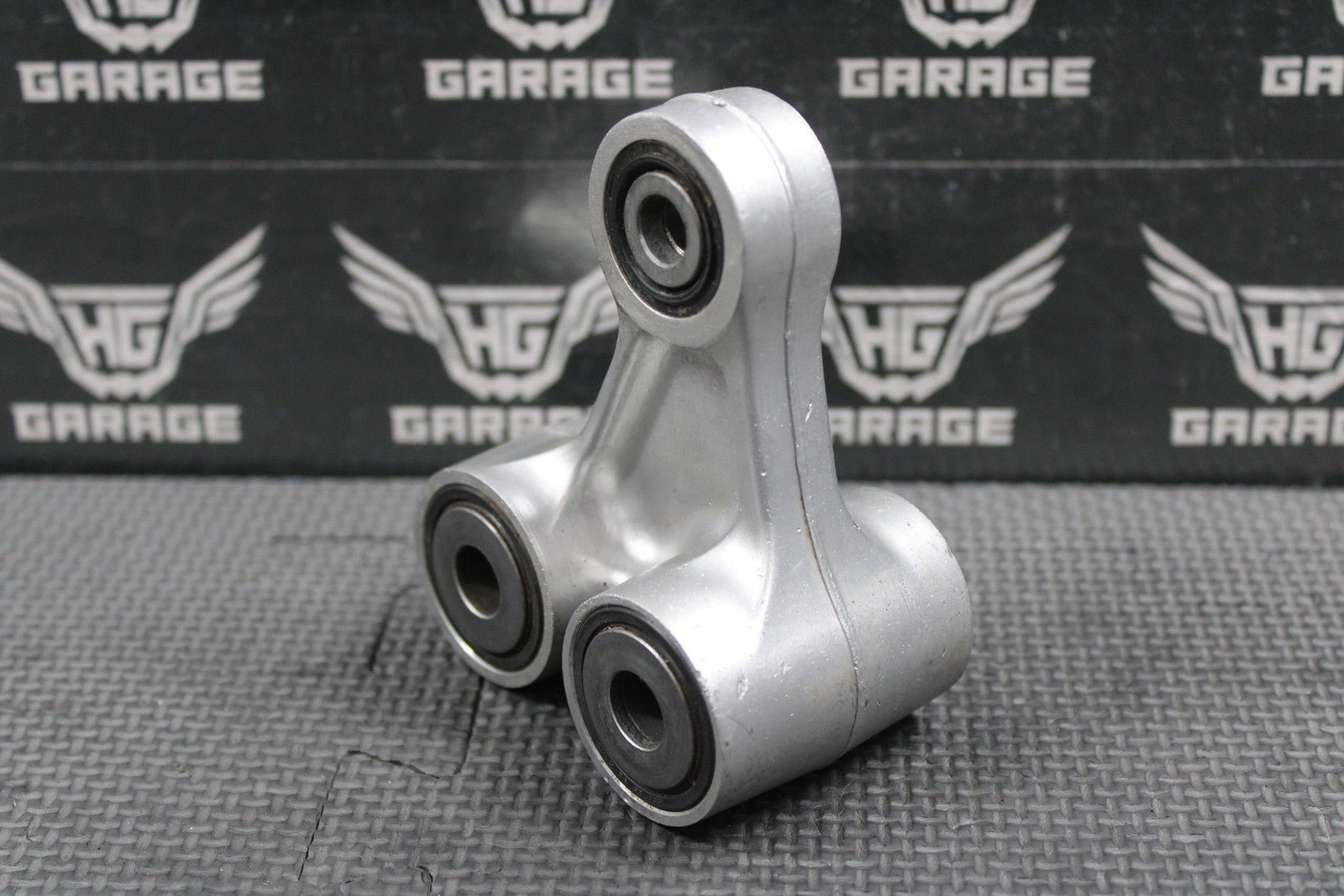 2003 2004 HONDA CRF450R OEM REAR SHOCK LINKAGE CUSHION ARM 52465 - MEB - 750 - hggarage