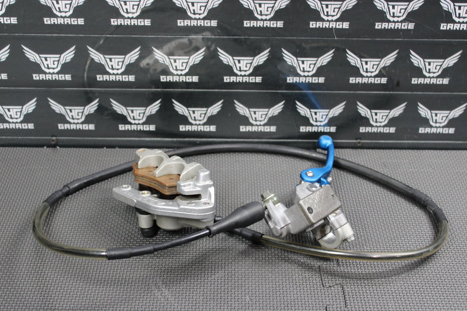 2006 Kawasaki KX450F OEM Nissin Front Brake Caliper Master Cylinder 43015 - 0167 - hggarage